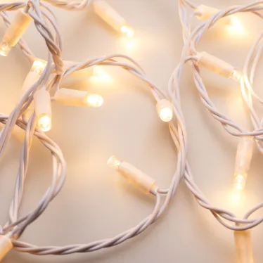 Светодиодная гирлянда ARD-STRING-CLASSIC-10000-WHITE-100LED-STD WARM (230V, 7W) | 025809 | Arlight