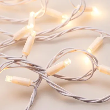 Светодиодная гирлянда ARD-STRING-CLASSIC-10000-WHITE-100LED-STD WARM (230V, 7W) | 025809 | Arlight