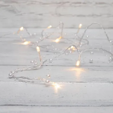 Гирлянда светодиодная Жемчужинки 1,5 м, 10 LED, прозрачный ПВХ, цвет свечения теплый белый, 2 х АА (батарейки не в комплекте) | 303-097 | NEON-NIGHT
