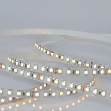 Лента гибкая светодиодная на самоклеящейся основе. ULS-2835-120LED/m-8мм-IP20-DC24V-9,6W/m-5м-3000K Катушка 5 м. в герметичной упаковке. (3000K).