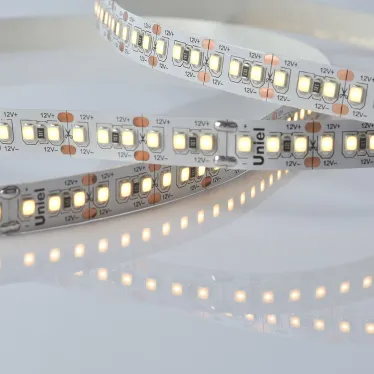 Лента гибкая светодиодная на самоклеящейся основе. ULS-M16-2835-180LED/m-10мм-IP20-DC12V-17W/m-5м-3000K PROFI Катушка 5м. в герметичной упаковке. Теплый (3000К)