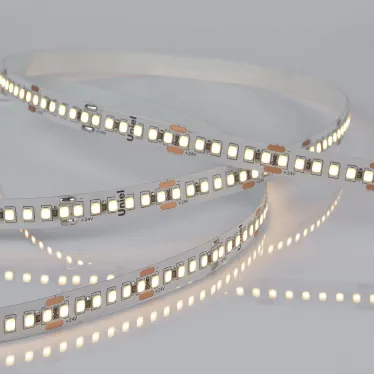 Гибкая светодиодная лента на самоклеящейся основе. ULS-2835-180LED/m-10mm-IP20-DC24V-17W/m-5M-3000K Катушка 5м. в герметичной упаковке. Теплый белый свет(3000К). ТМ Uniel