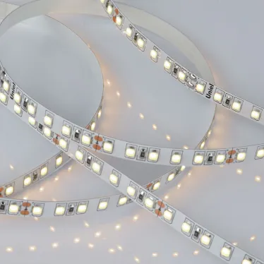 Лента гибкая светодиодная на самоклеящейся основе. ULS-2835-120LED/m-8мм-IP20-DC24V-9,6W/m-5м-3000K Катушка 5 м. в герметичной упаковке. (3000K).