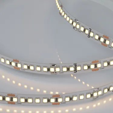 Гибкая светодиодная лента на самоклеящейся основе. ULS-2835-180LED/m-10mm-IP20-DC24V-17W/m-5M-3000K Катушка 5м. в герметичной упаковке. Теплый белый свет(3000К). ТМ Uniel