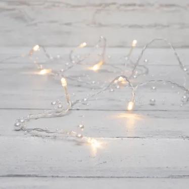 Гирлянда светодиодная Жемчужинки 1,5 м, 10 LED, прозрачный ПВХ, цвет свечения теплый белый, 2 х АА (батарейки не в комплекте) | 303-097 | NEON-NIGHT