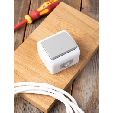 Выключатель Мурманск проходной 1-клавишный 10А IP54 серый